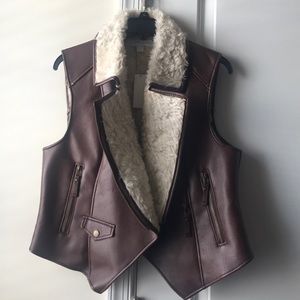 Faux fur and “leather” vest